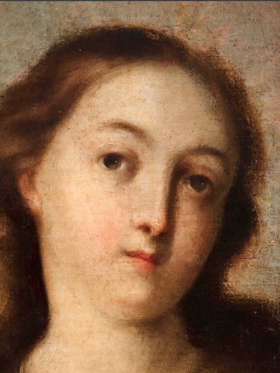 El rostro de la Virgen entre querubines